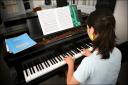 Piano student at work